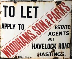 Enamel sign for Woodhams, Son and Parks